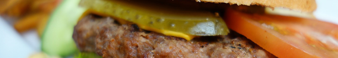 Eating Burger Fast Food at Burger Box restaurant in Richland Hills, TX.